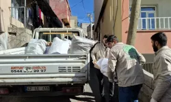 Umut Kervanı Mardin'de ihtiyaç sahibi ailelere odun ve soba yardımı yaptı