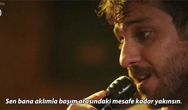 Sen bana aklımla başım arasındaki mesafe kadar yakınsın