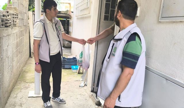 Tarsus Umut Kervanı'ndan muhtaç ailelere kurban eti yardımı